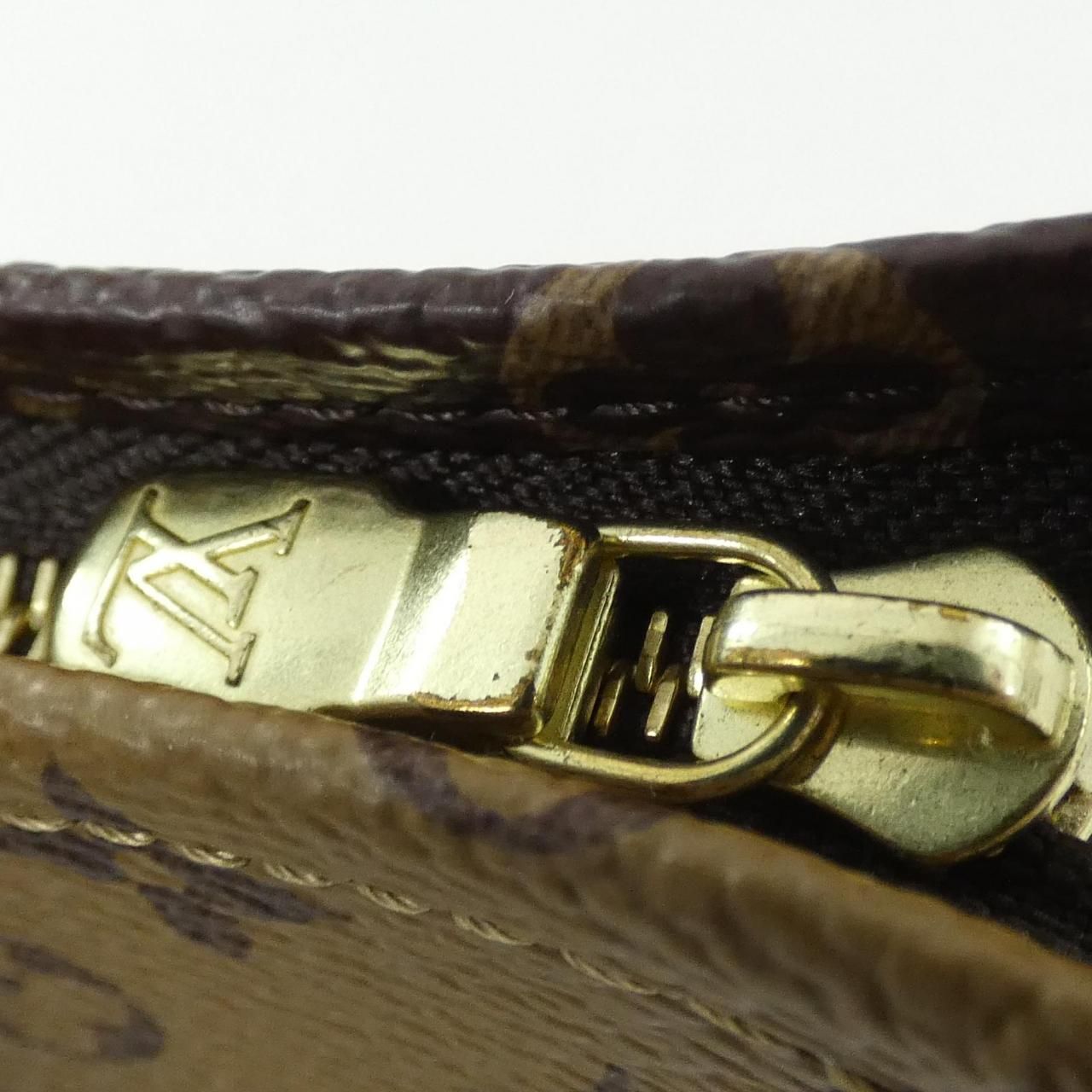 Louis Vuitton Monogram Reverse Trio Poche Toilette Pouch — view 5