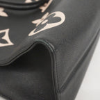 Louis Vuitton Tote Monogram Empreinte Bicolor On The Go MM Black Beige 2-Way — view 8