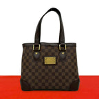 Louis Vuitton Hampstead PM Damier Logo Plate Leather Tote Brown