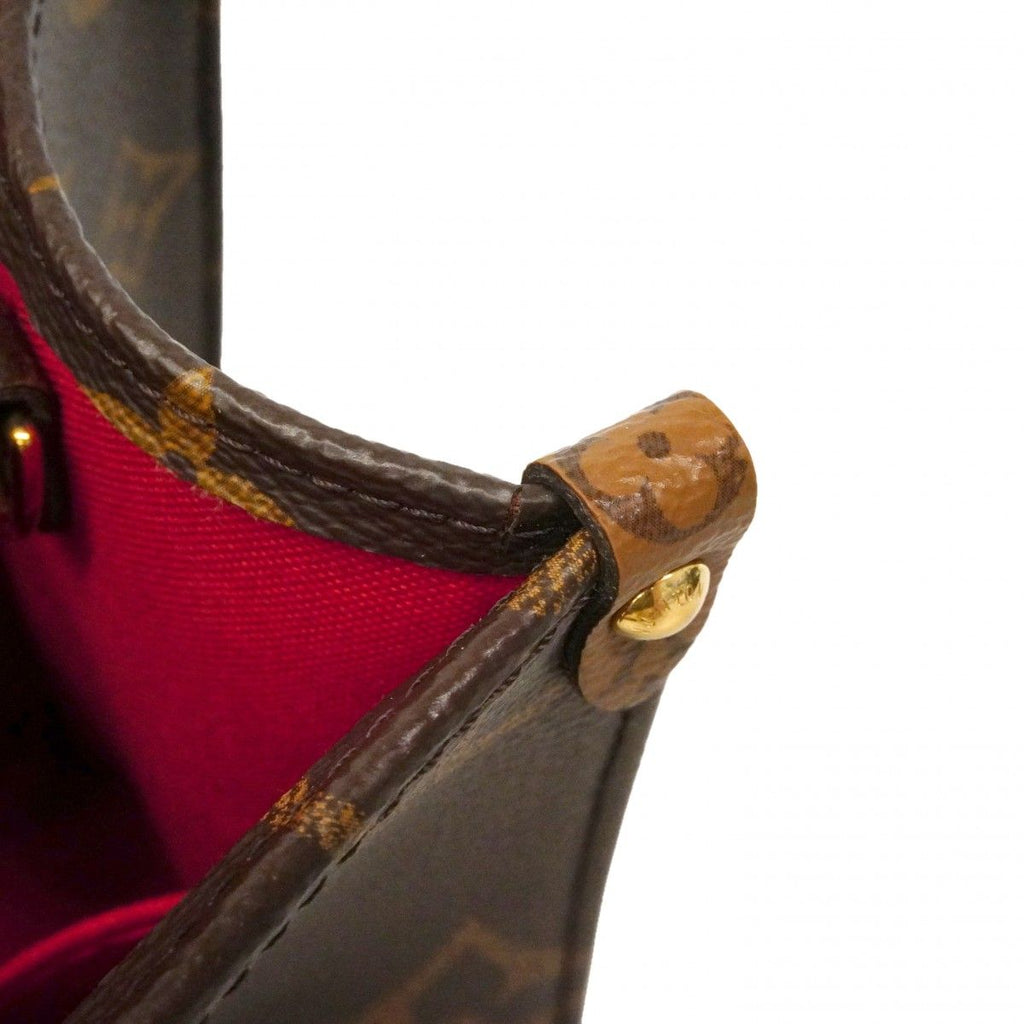 Louis Vuitton Handbag Monogram Giant Reverse On The Go PM Brown 2-Way — view 8