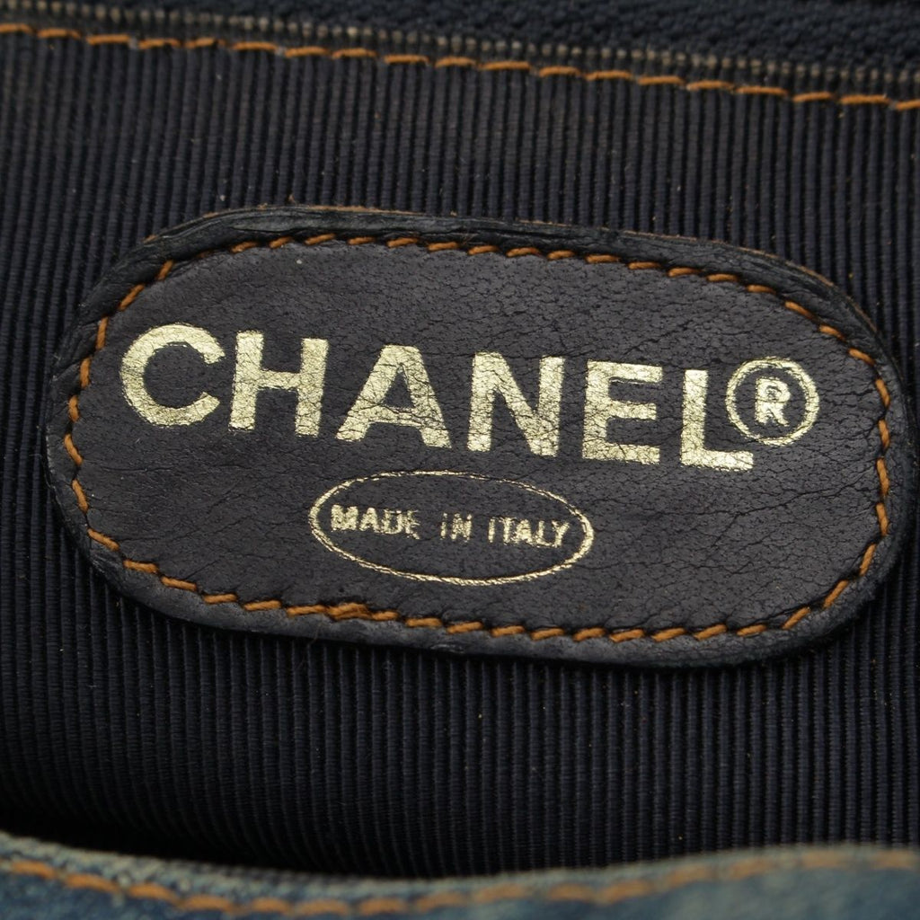 Chanel Quilted Denim CC Logo Handbag Drawstring Indigo Blue Brown