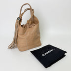 Chanel CC Logo Fringe Drawstring Handbag Leather Beige Vintage — view 2