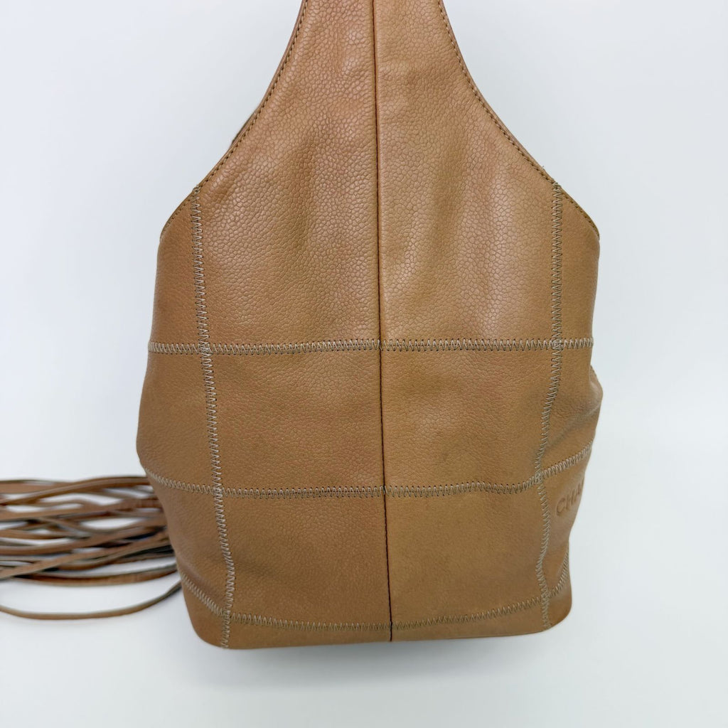 Chanel CC Logo Fringe Drawstring Handbag Leather Beige Vintage — view 4