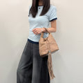Chanel CC Logo Fringe Drawstring Handbag Leather Beige Vintage