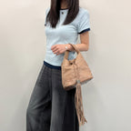 Chanel CC Logo Fringe Drawstring Handbag Leather Beige Vintage