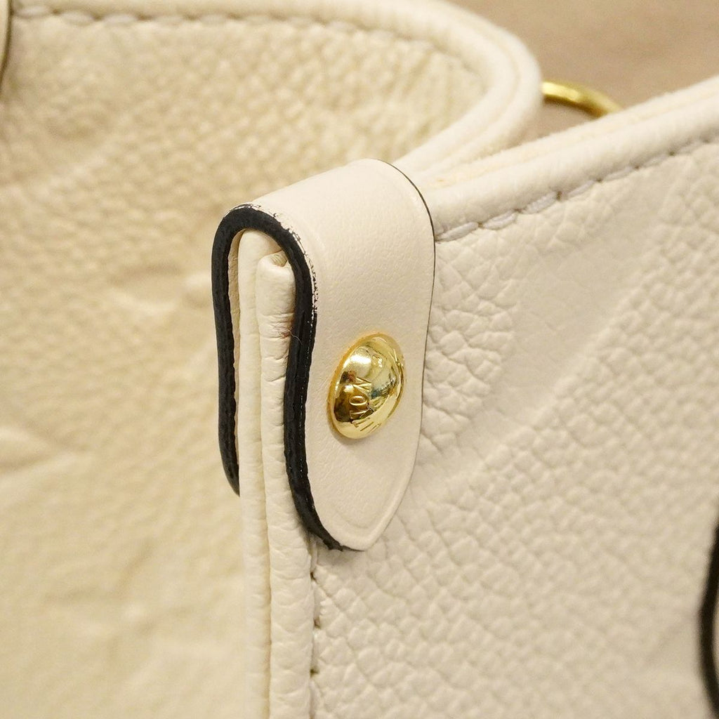 Louis Vuitton Handbag Monogram Empreinte On The Go PM Cream 2-Way — view 6