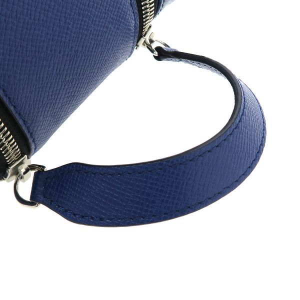 Louis Vuitton Taiga Llama Dopp Kit Handbag — view 5
