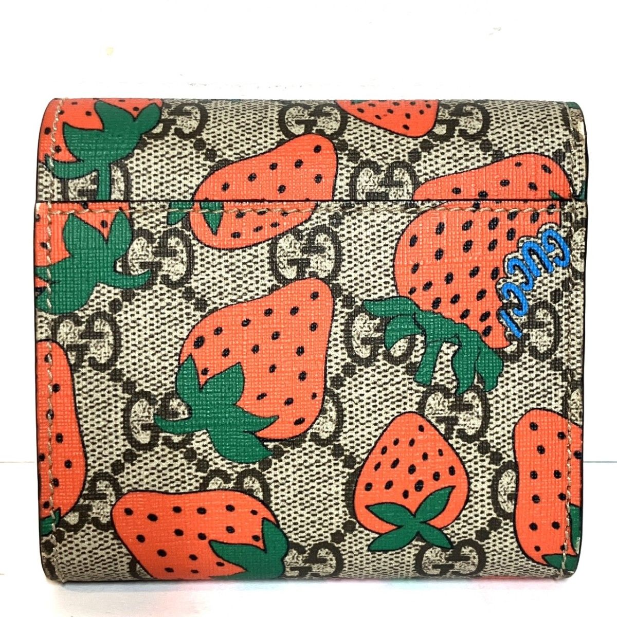 Gucci Strawberry GG Supreme Bifold Wallet Leather