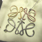 Loewe Anagram Metal Gold Silver Blanc's Gunmetal Brooch — view 5