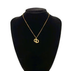 Dior Vintage CD Logo Motif Pendant Gold