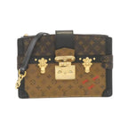 Louis Vuitton Monogram Reverse Trunk Clutch
