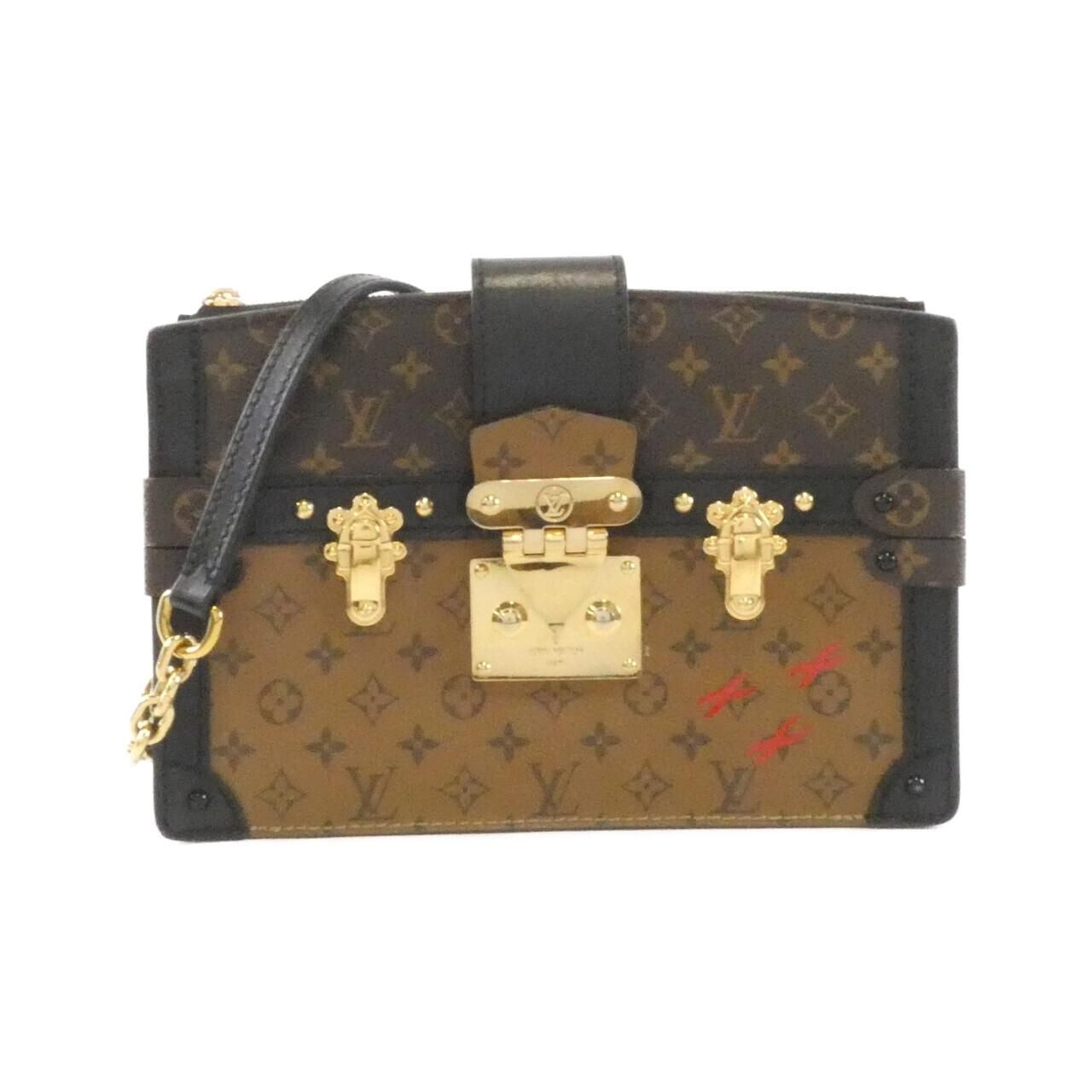 Louis Vuitton Monogram Reverse Trunk Clutch