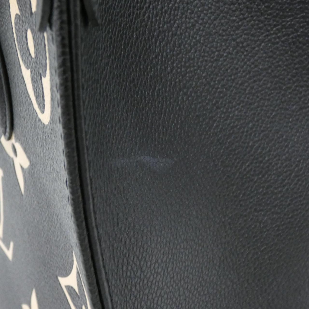 Louis Vuitton On The Go MM Empreinte Bicolor Tote Bag