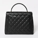 Chanel Quilted CC Logo CC Handbag Top Handle Turnlock Caviar Leather Black Gold — view 2