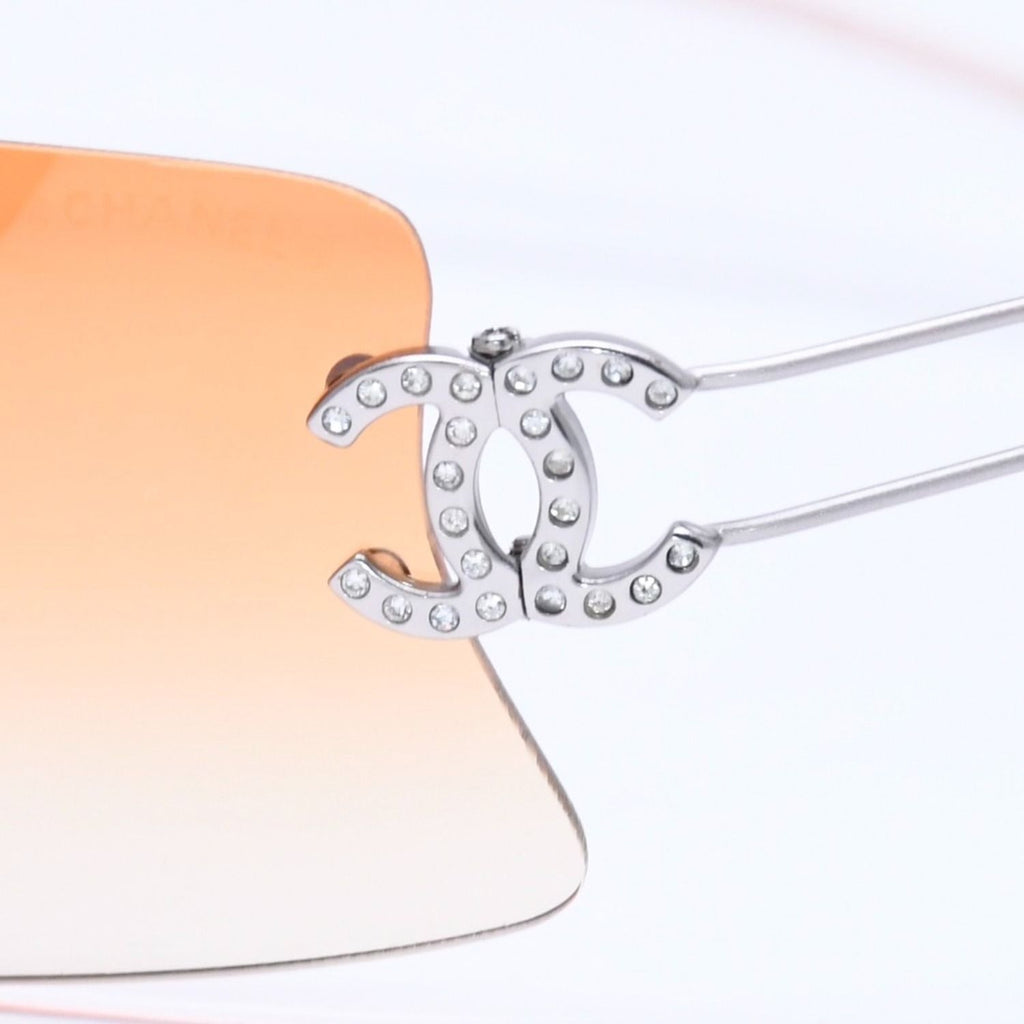 Chanel Rimless Sunglasses Orange Gradient Lens Rhinestone CC Logo Silver Eyewear — view 7