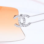 Chanel Rimless Sunglasses Orange Gradient Lens Rhinestone CC Logo Silver Eyewear — view 7