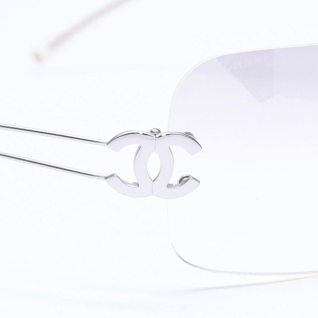 Chanel Rimless Sunglasses Side CC Logo Light Gray Gradient Silver Frame Eyewear — view 8