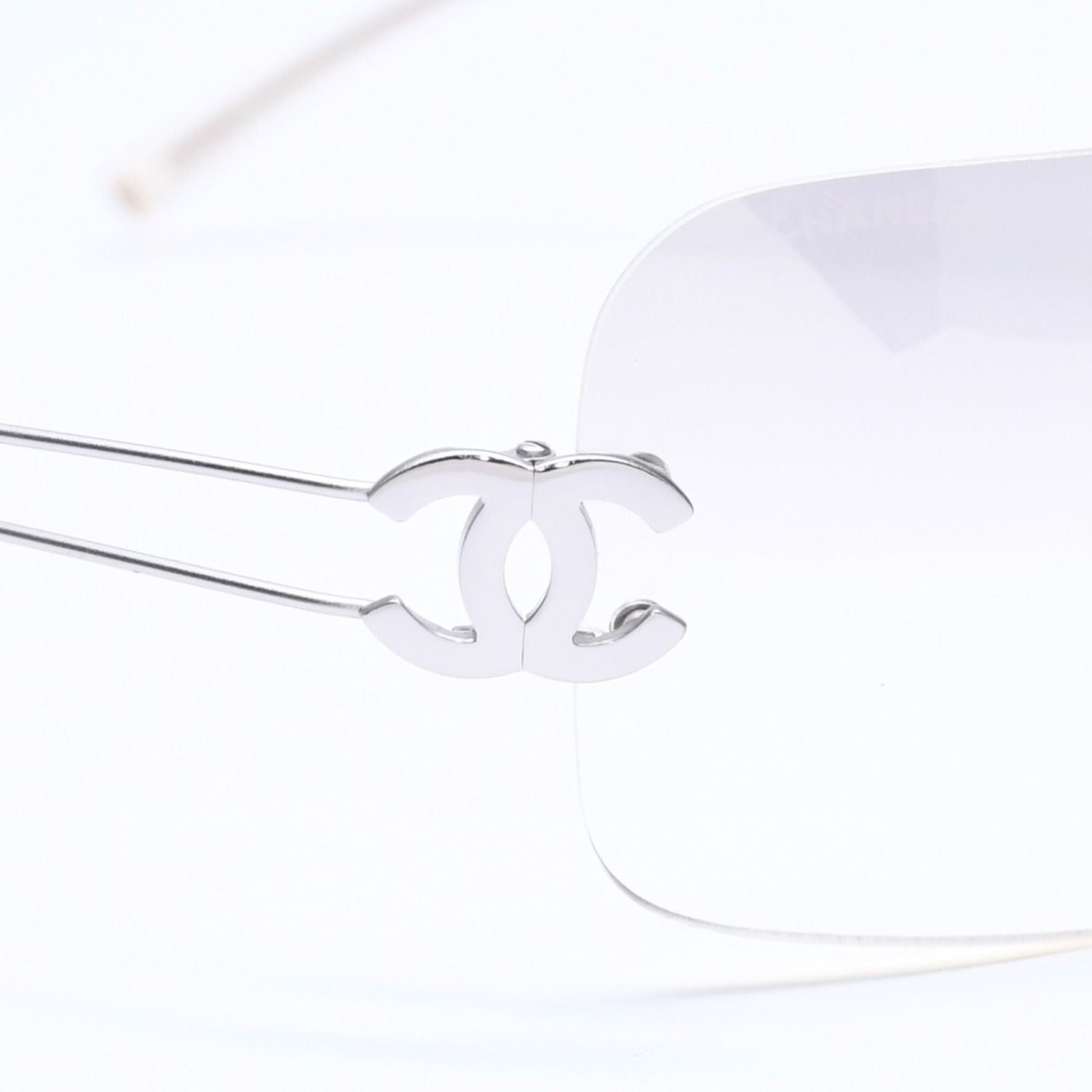 Chanel Rimless Sunglasses Side CC Logo Light Gray Gradient Silver Frame Eyewear — view 8
