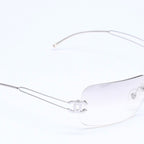 Chanel Rimless Sunglasses Side CC Logo Light Gray Gradient Silver Frame Eyewear — view 4