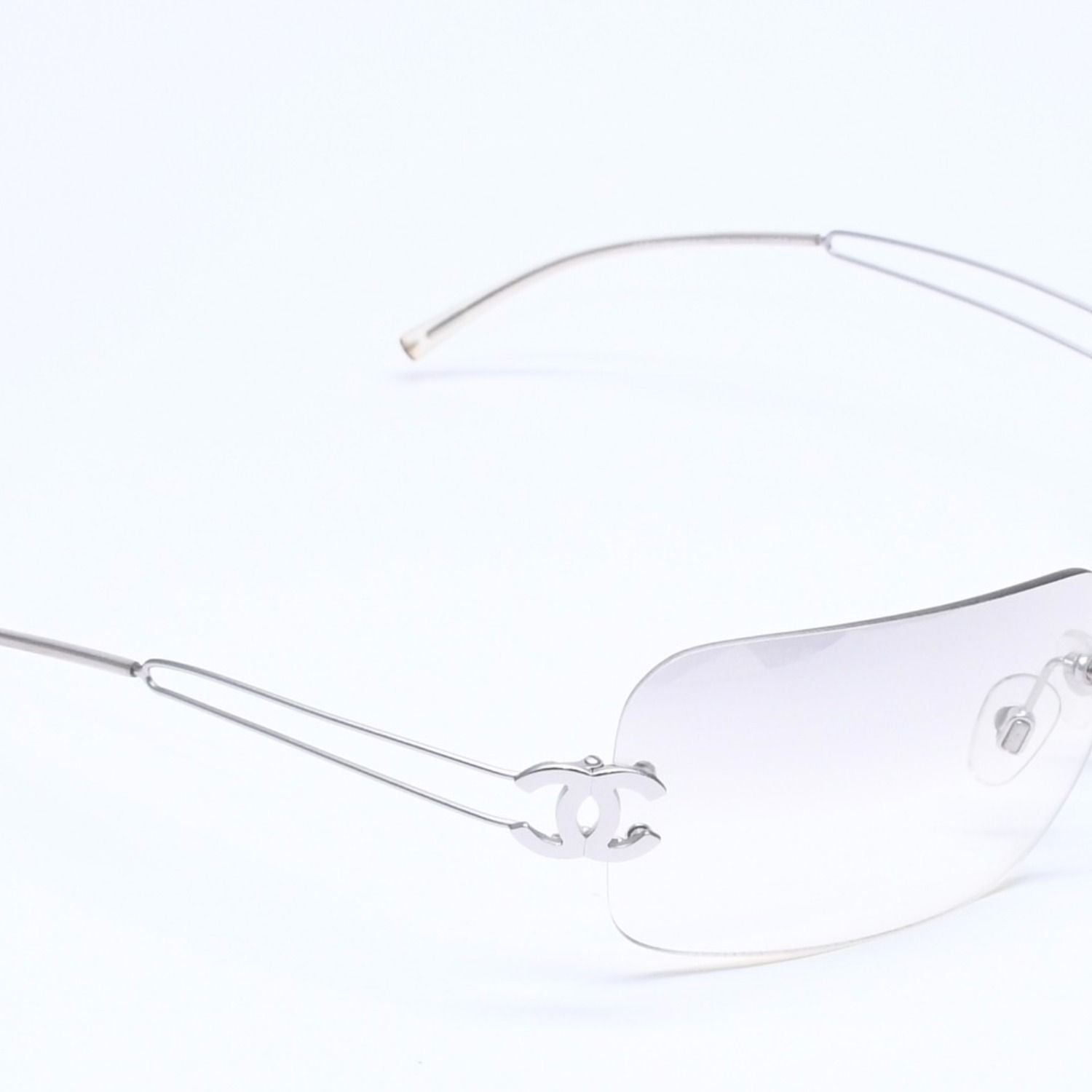 Chanel Rimless Sunglasses Side CC Logo Light Gray Gradient Silver Frame Eyewear — view 4