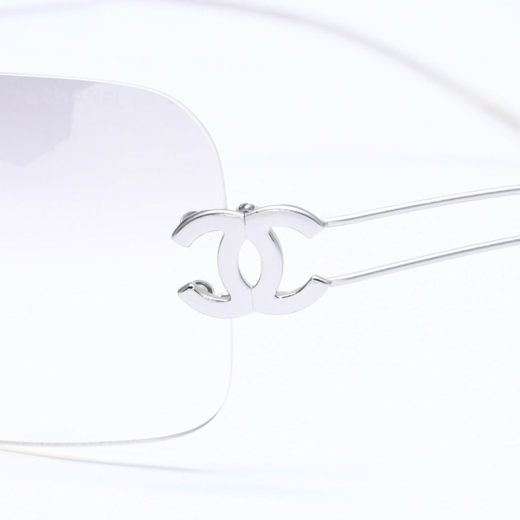 Chanel Rimless Sunglasses Side CC Logo Light Gray Gradient Silver Frame Eyewear — view 7