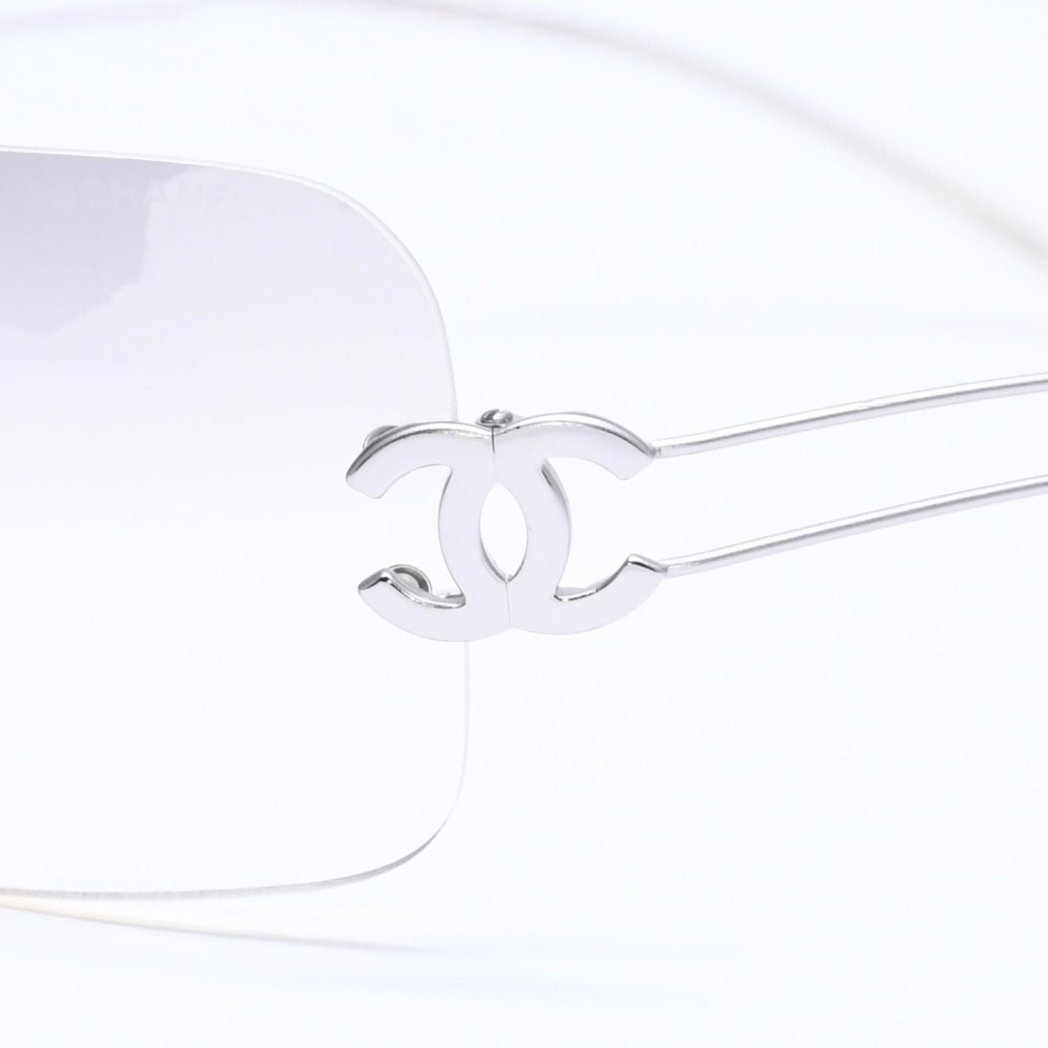 Chanel Rimless Sunglasses Side CC Logo Light Gray Gradient Silver Frame Eyewear — view 7