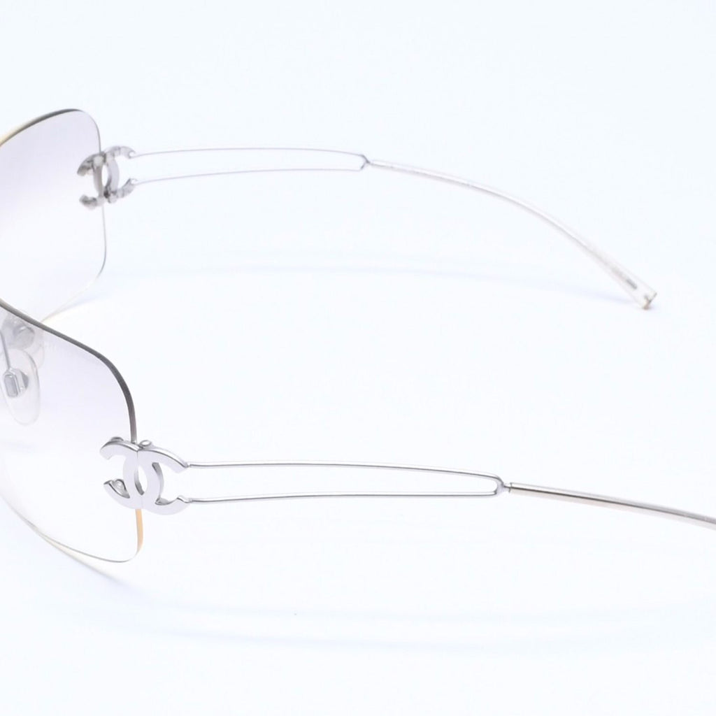 Chanel Rimless Sunglasses Side CC Logo Light Gray Gradient Silver Frame Eyewear — view 6