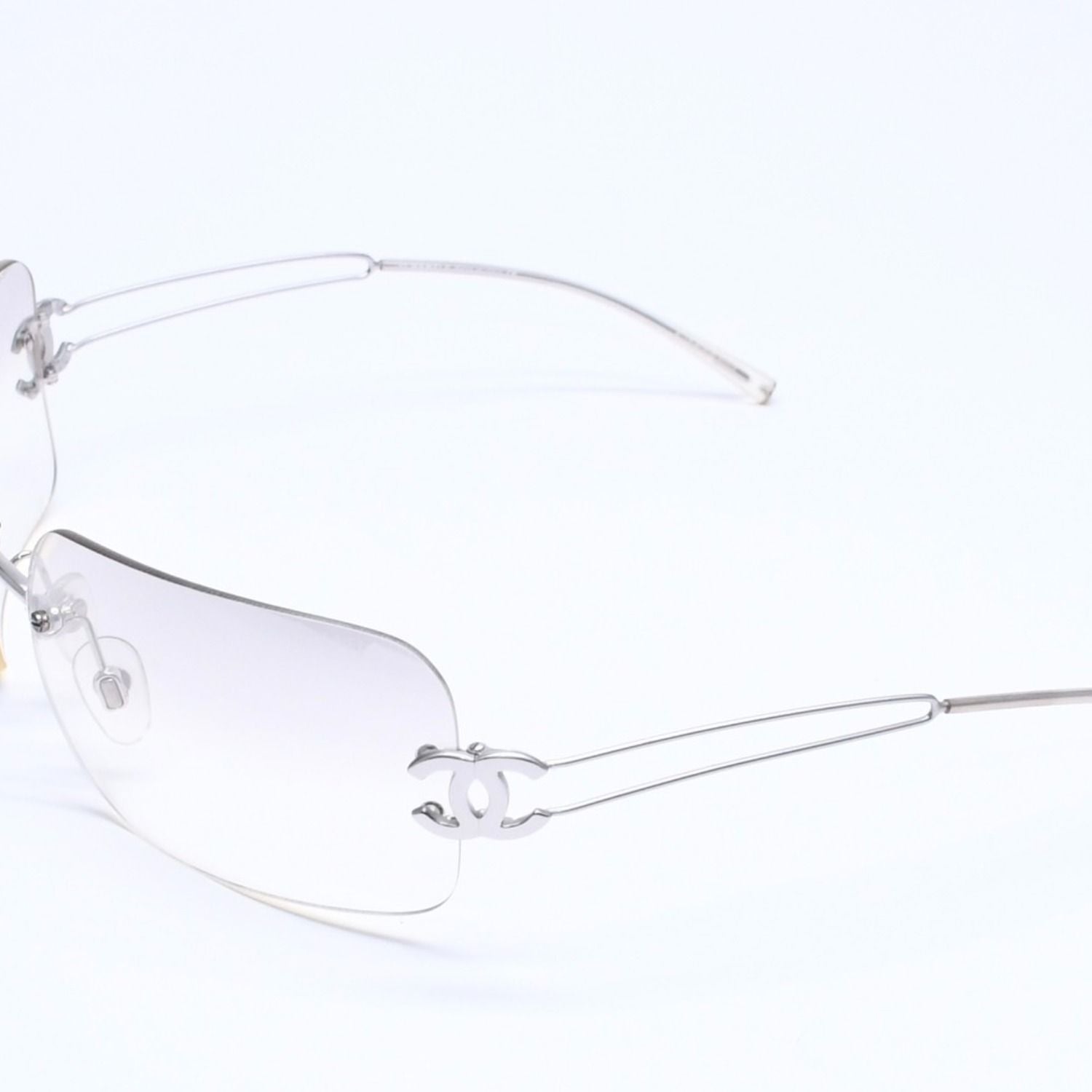 Chanel Rimless Sunglasses Side CC Logo Light Gray Gradient Silver Frame Eyewear — view 3