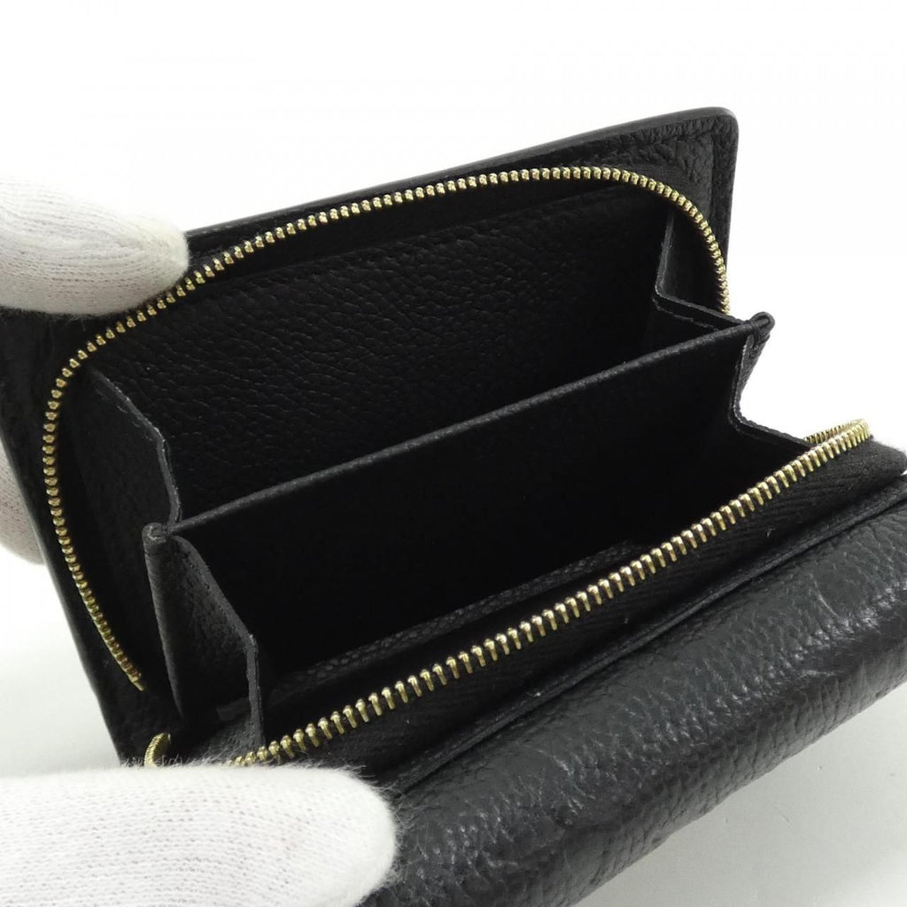 Louis Vuitton Monogram Empreinte Portefeuille Metis Compact Wallet — view 7