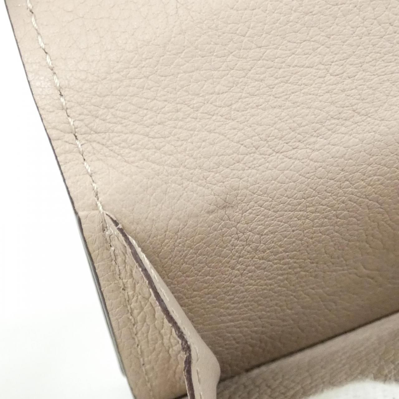Louis Vuitton Portefeuille Lock Mini Wallet — view 8