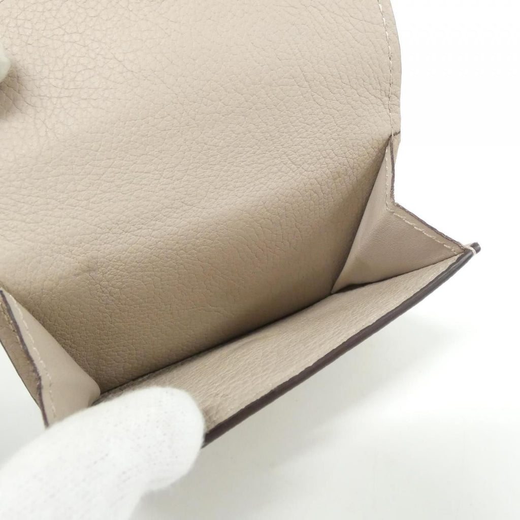 Louis Vuitton Portefeuille Lock Mini Wallet — view 7