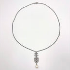 Chanel CC Logo Emblem Faux Pearl Metal Silver White Necklace — view 4