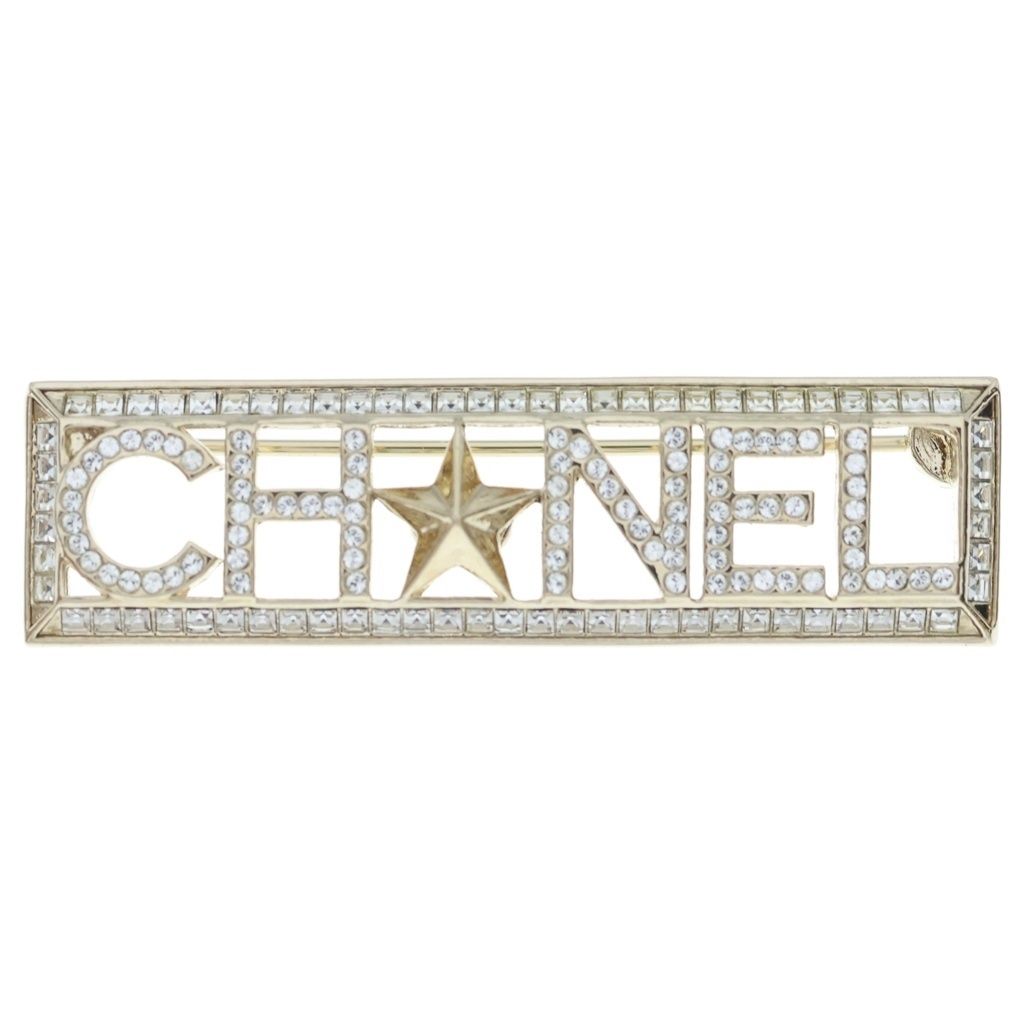 Chanel Rhinestone Logo Brooch Pin Badge Gold