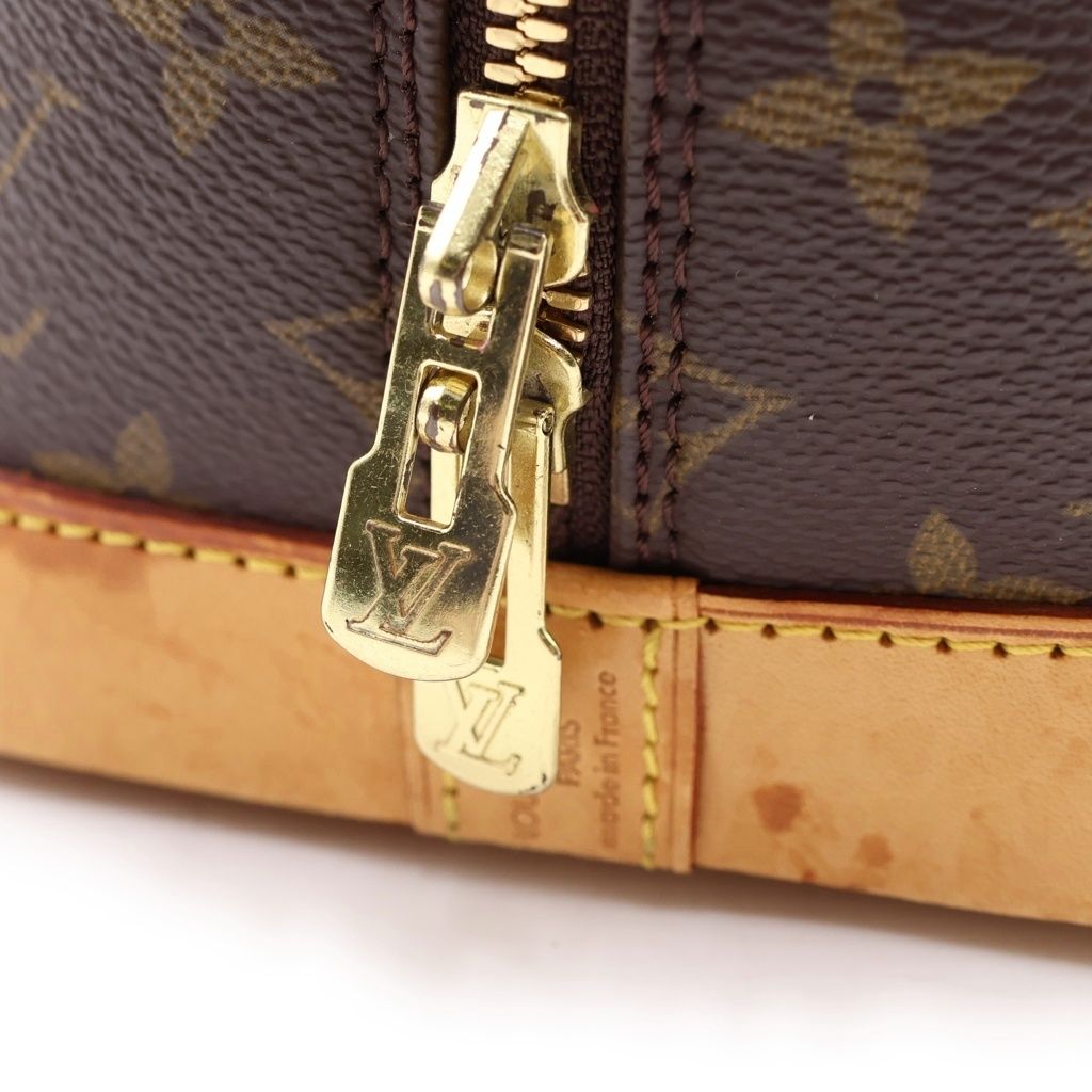 Louis Vuitton Monogram Alma Leather Handbag Brown — view 6