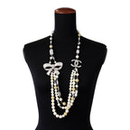 Chanel Necklace CC Logo Ribbon Motif Rhinestone Faux Pearl 08 — view 4
