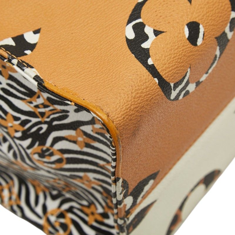 Louis Vuitton Monogram Jungle On The Go GM Tote Ivory Orange Leather — view 7