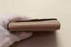 Louis Vuitton Leather Lock Mini Trifold Wallet — view 3