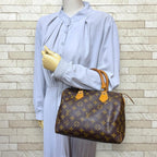 Louis Vuitton Speedy 25 Monogram Handbag Canvas Brown — view 2