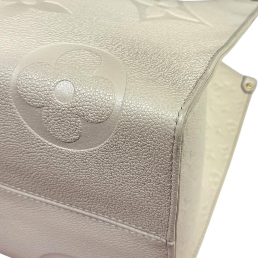 Louis Vuitton On The Go GM Monogram Empreinte Shoulder Bag Beige — view 8
