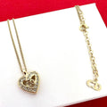 Dior CD Logo Heart Motif Rhinestone Pendant Gold