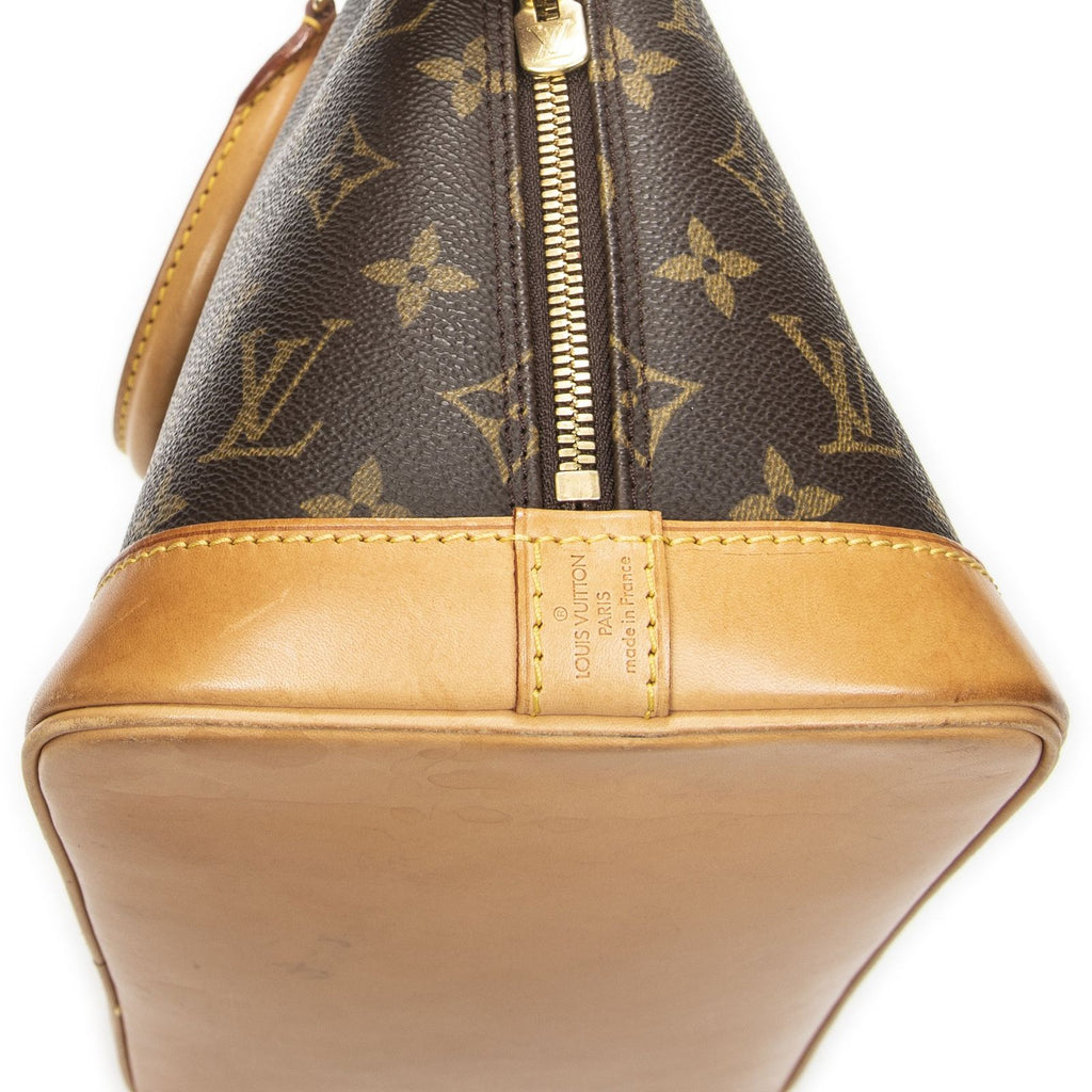 Louis Vuitton Alma Brown Monogram Canvas Handbag — view 7