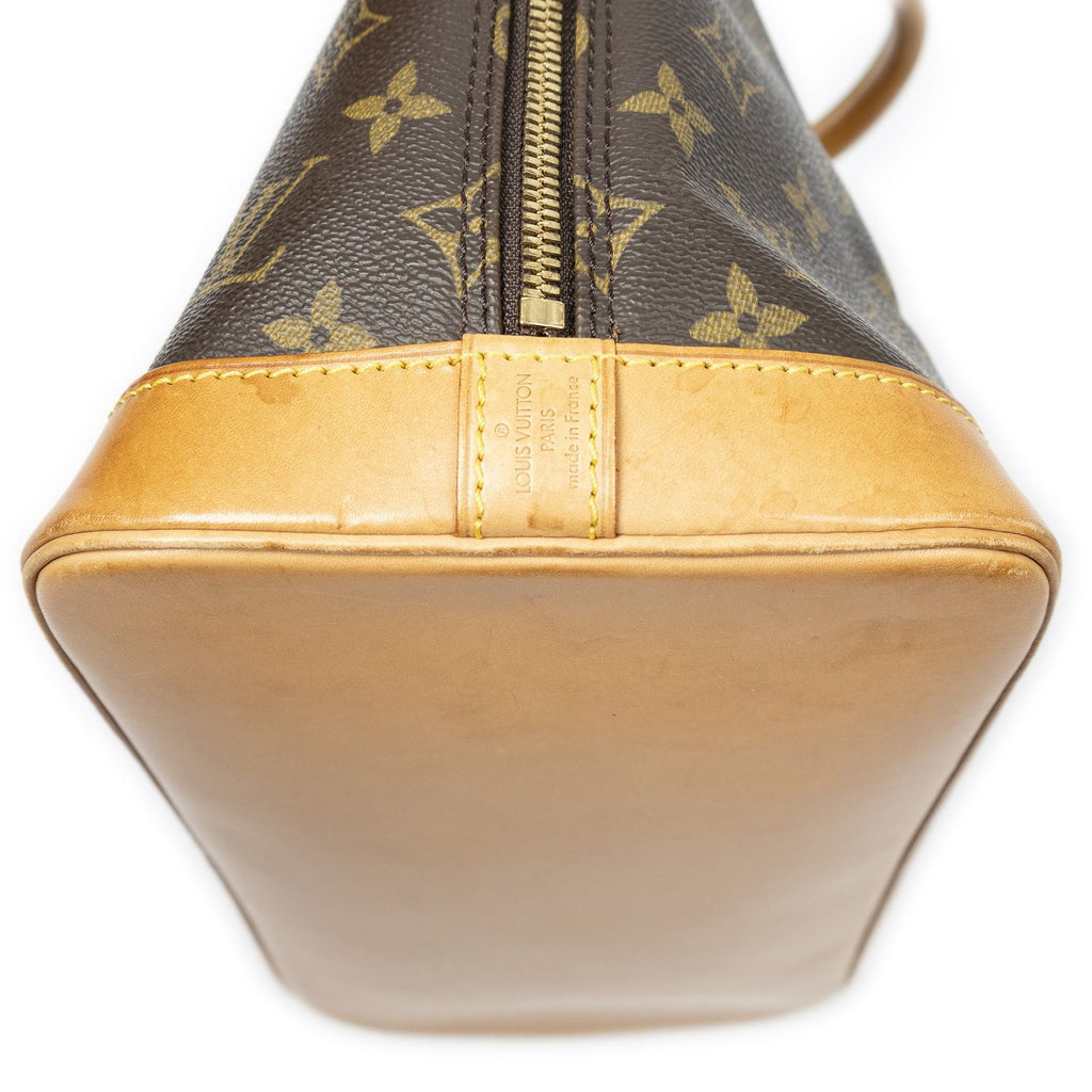 Louis Vuitton Alma Brown Monogram Canvas Handbag — view 7