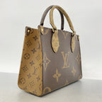 Louis Vuitton Handbag Monogram Giant Reverse On The Go PM Brown 2-Way — view 2