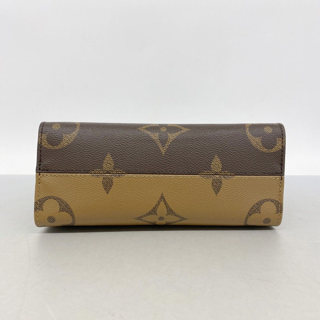 Louis Vuitton Handbag Monogram Giant Reverse On The Go PM Brown 2-Way — view 3