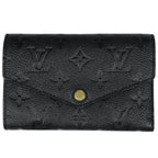 Louis Vuitton Portefeuille Curieuse Compact Trifold Wallet Monogram Empreinte