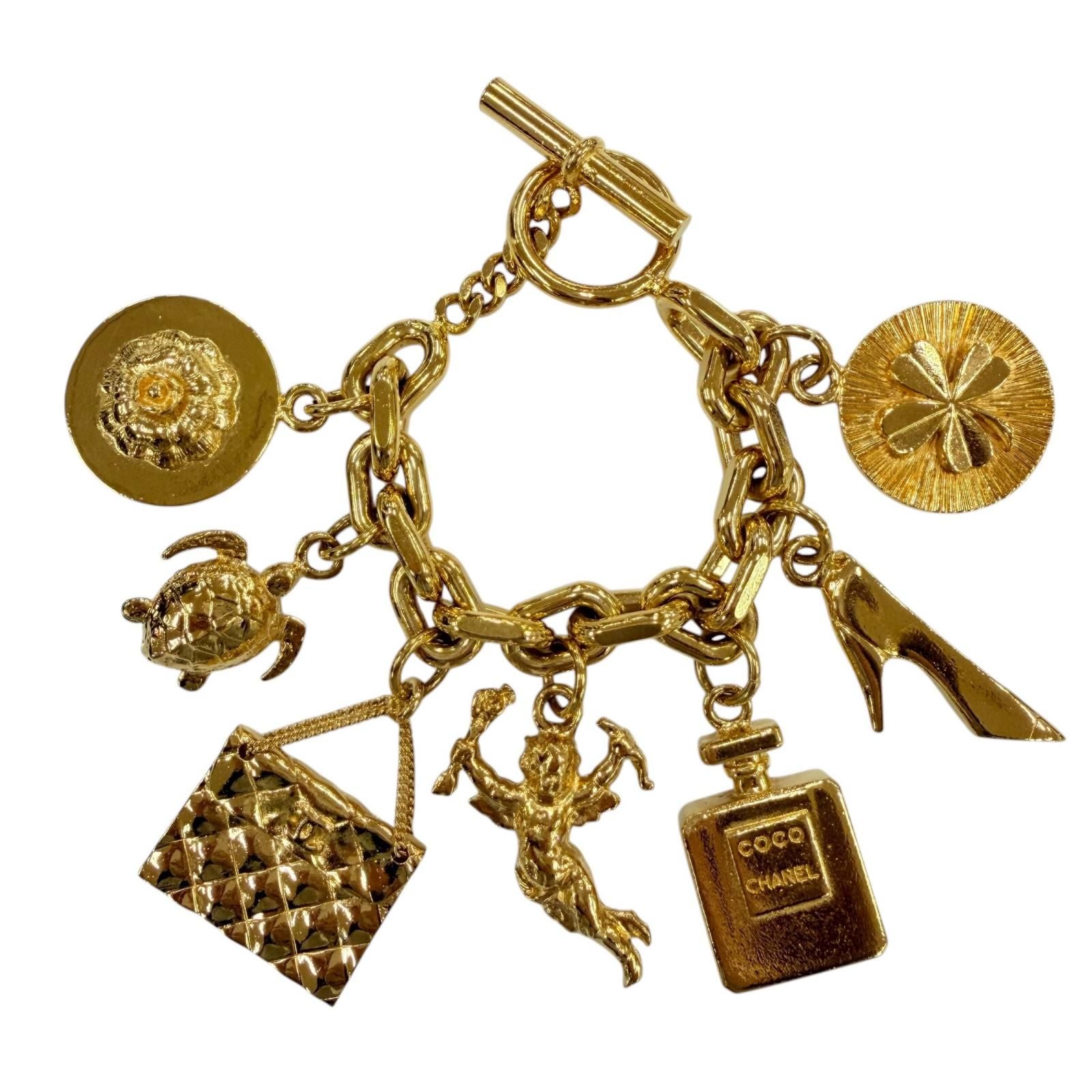 Chanel Vintage Metal Icon Charm 7 Row Bangle Bracelet Gold