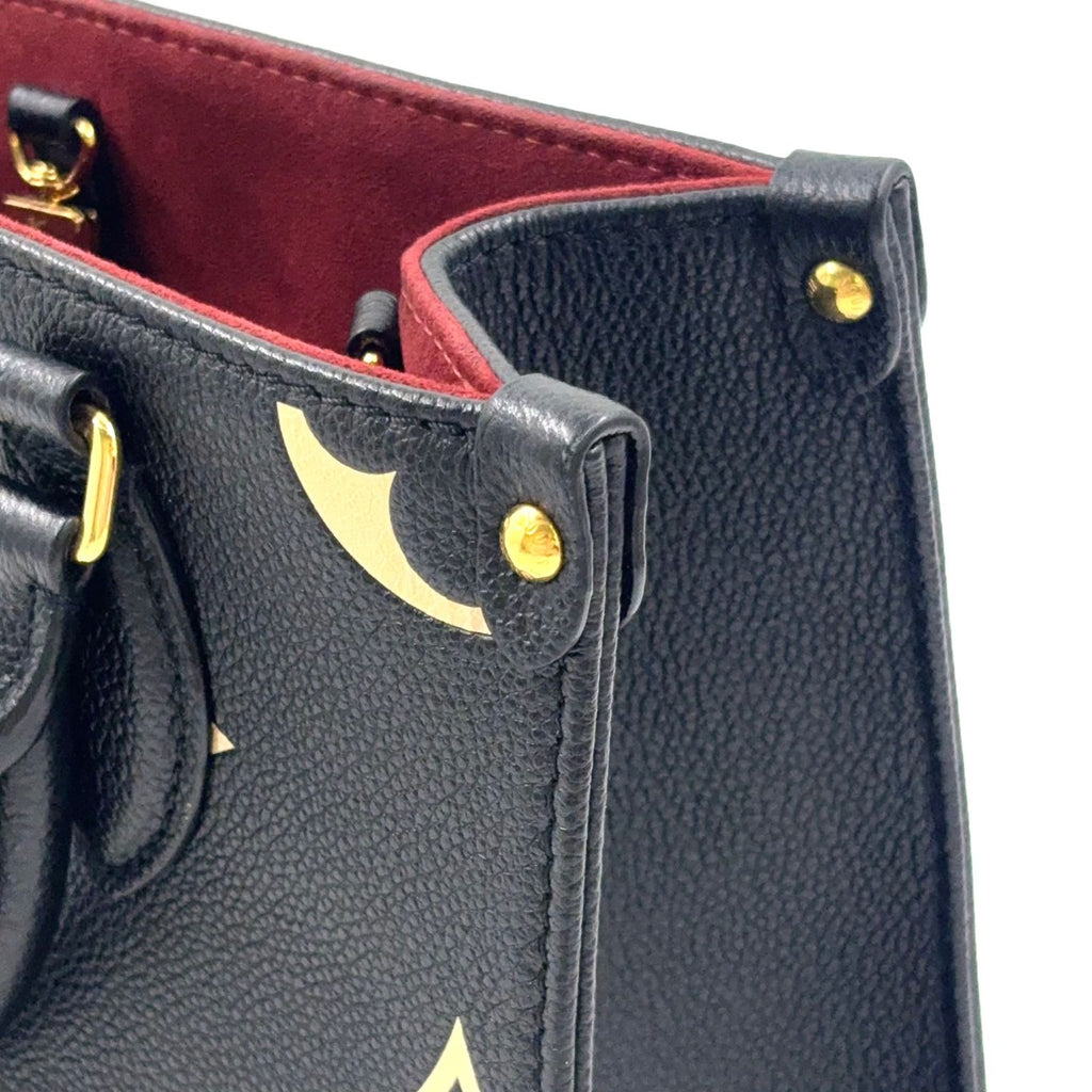 Louis Vuitton On The Go PM Bicolor Monogram Empreinte Correspondence Leather — view 9