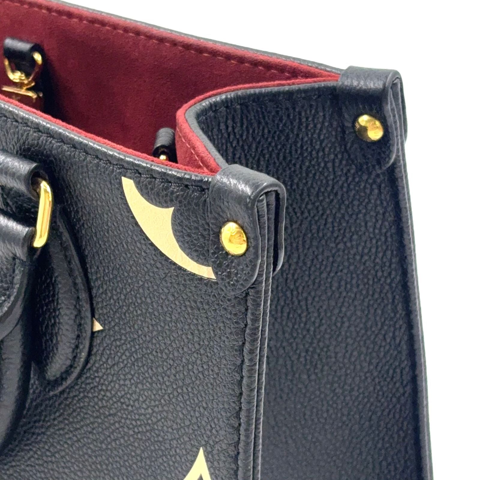 Louis Vuitton On The Go PM Bicolor Monogram Empreinte Correspondence Leather — view 9