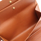 Louis Vuitton Monogram Porto Tresor International Wallet fold — view 6