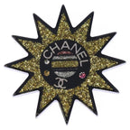 Chanel Sun Motif Rhinestone Brooch Pin Badge Black Yellow Resin Strass
